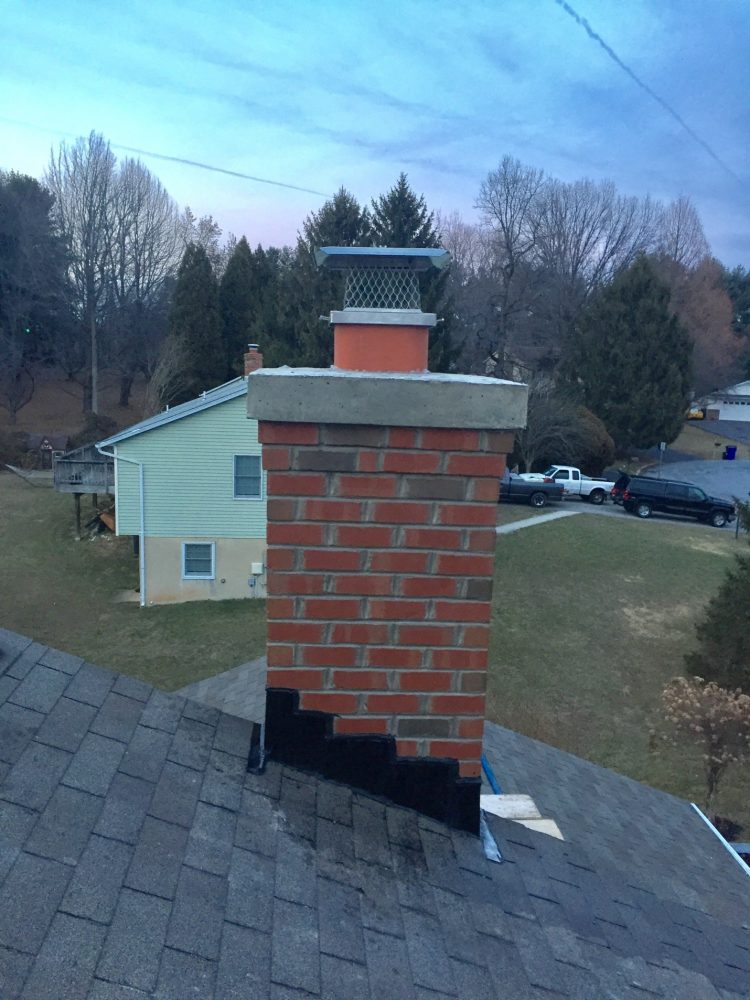repaired concrete chimney crown
