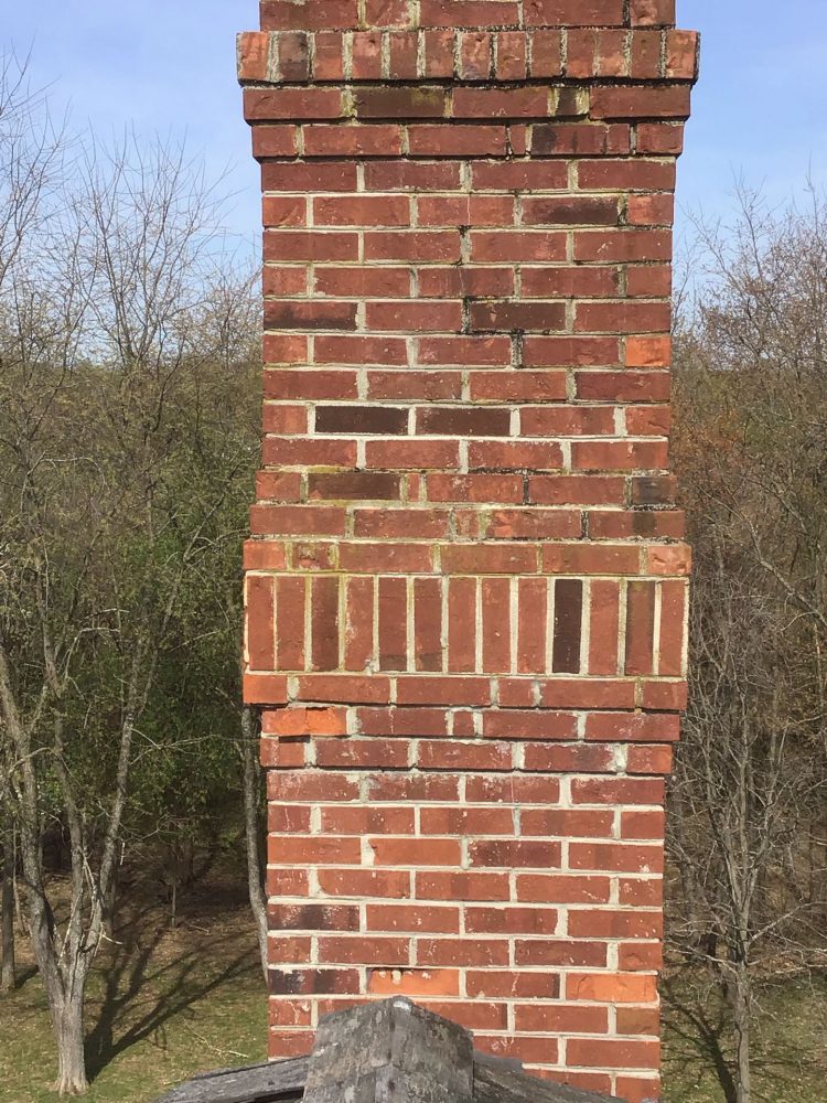 damaged chimney brick repaired